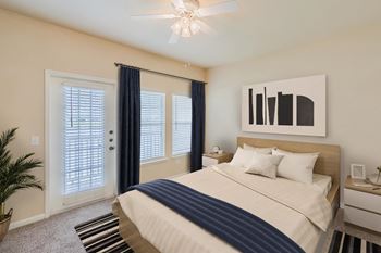 Bedroom with bed at Lakeside Pointe Apartments & Townhomes, Texas